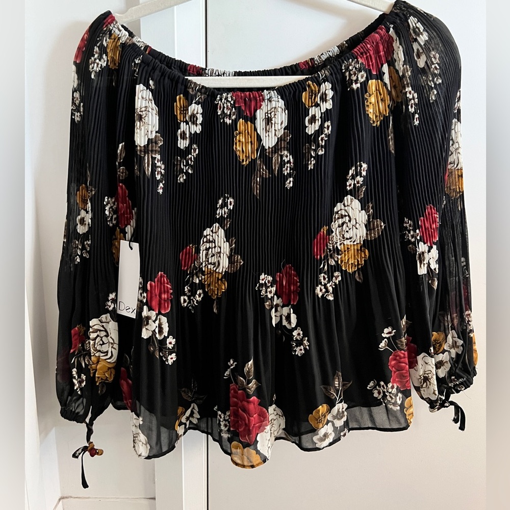 Pleated flowy off the shoulder floral top. Super cute and comfortable!